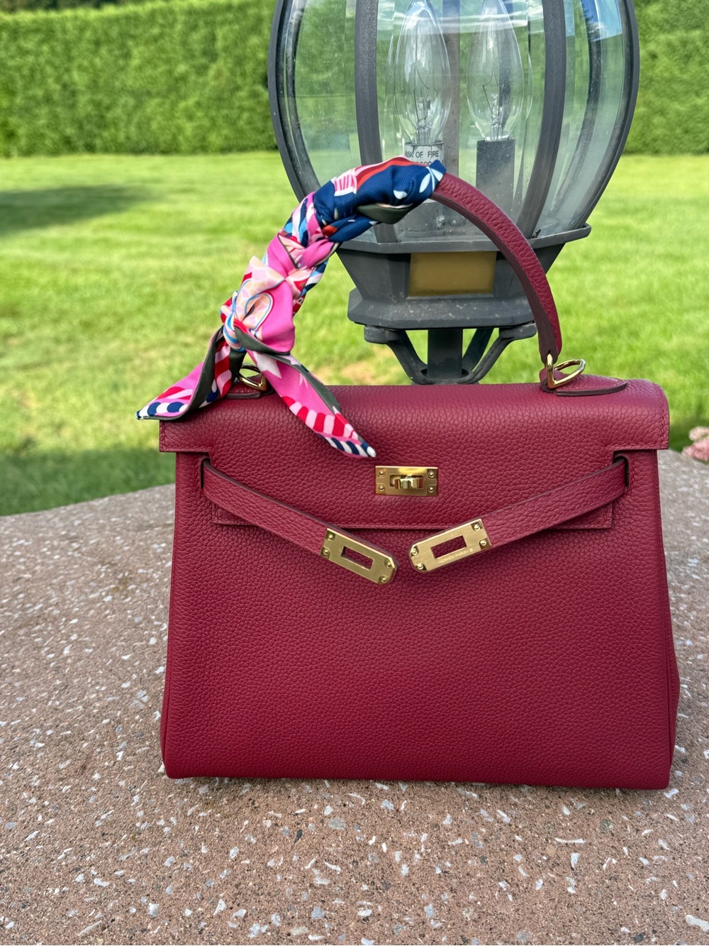 Luxury Ruby Red GHW Togo Leather Top-Handle Satchel with Silk Scarf Accent